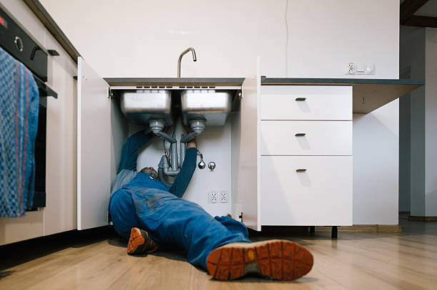 Professional Plumbing technician working in Clayton, NJ